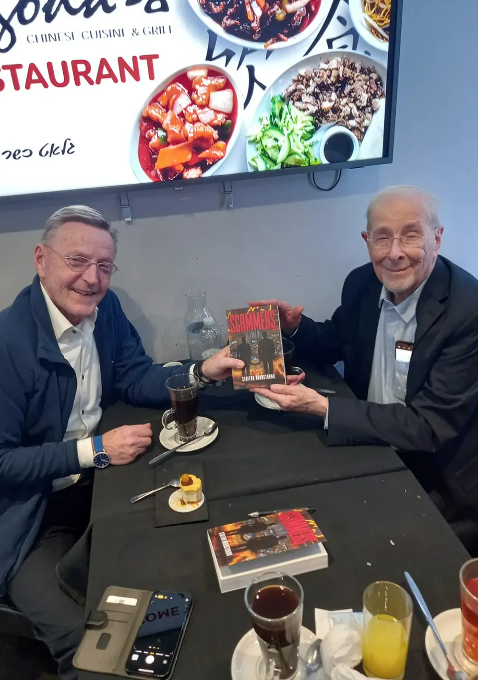 Book signing with publisher Lionel Ross